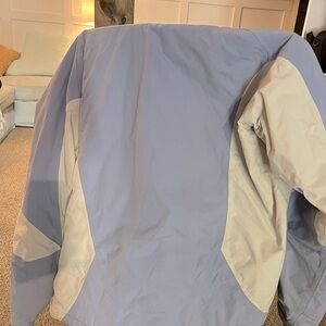 The North Face women’s ski/ winter jacket in light blue and cream.